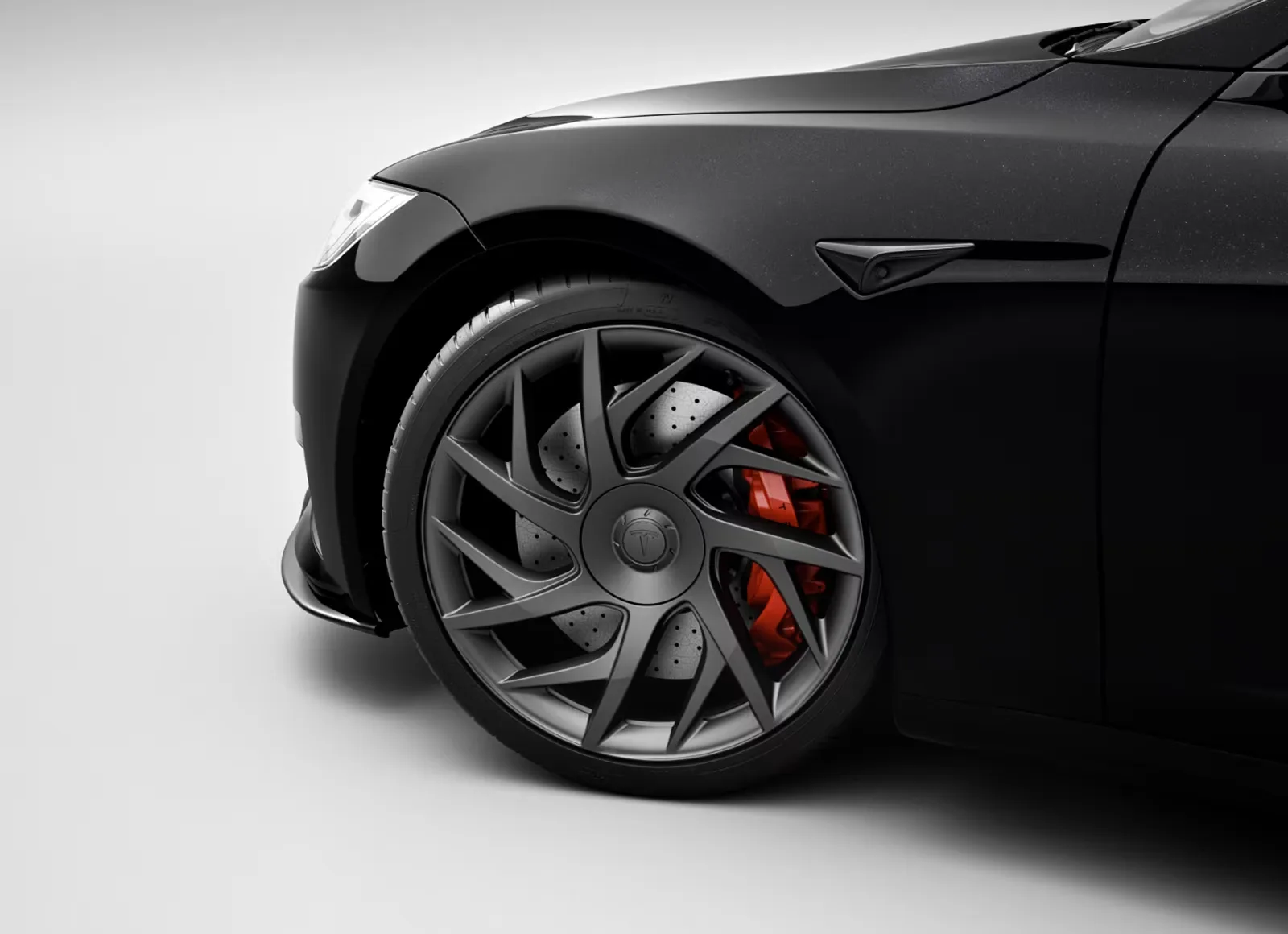 Forged wheel with red performance brake caliper