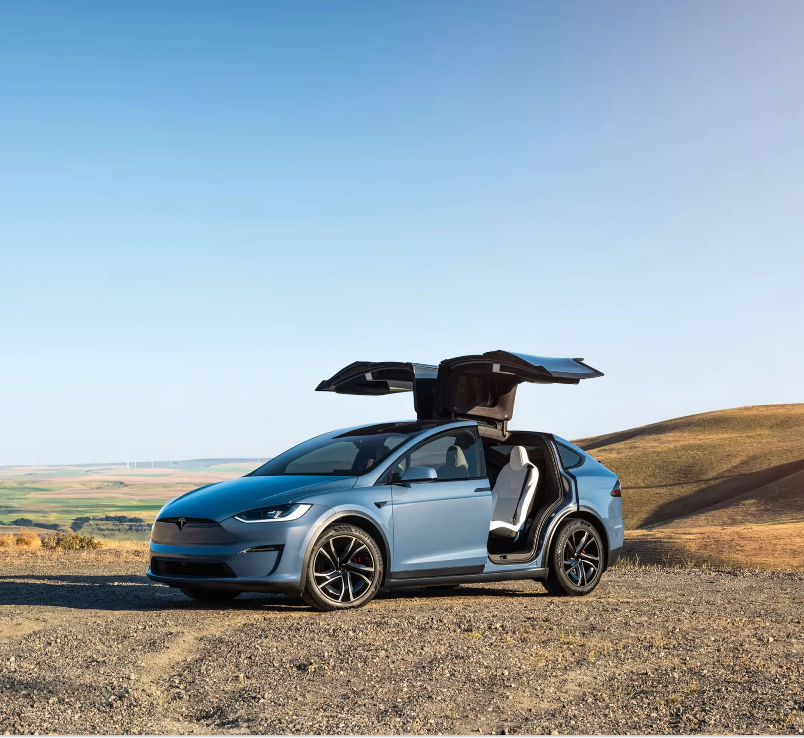 Model X with falcon-wing doors open